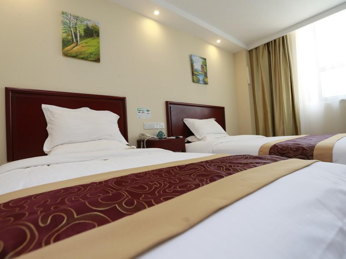 Greentree Inn Henan Qinyang Middle Huaifu Road Express Hotel Exteriör bild